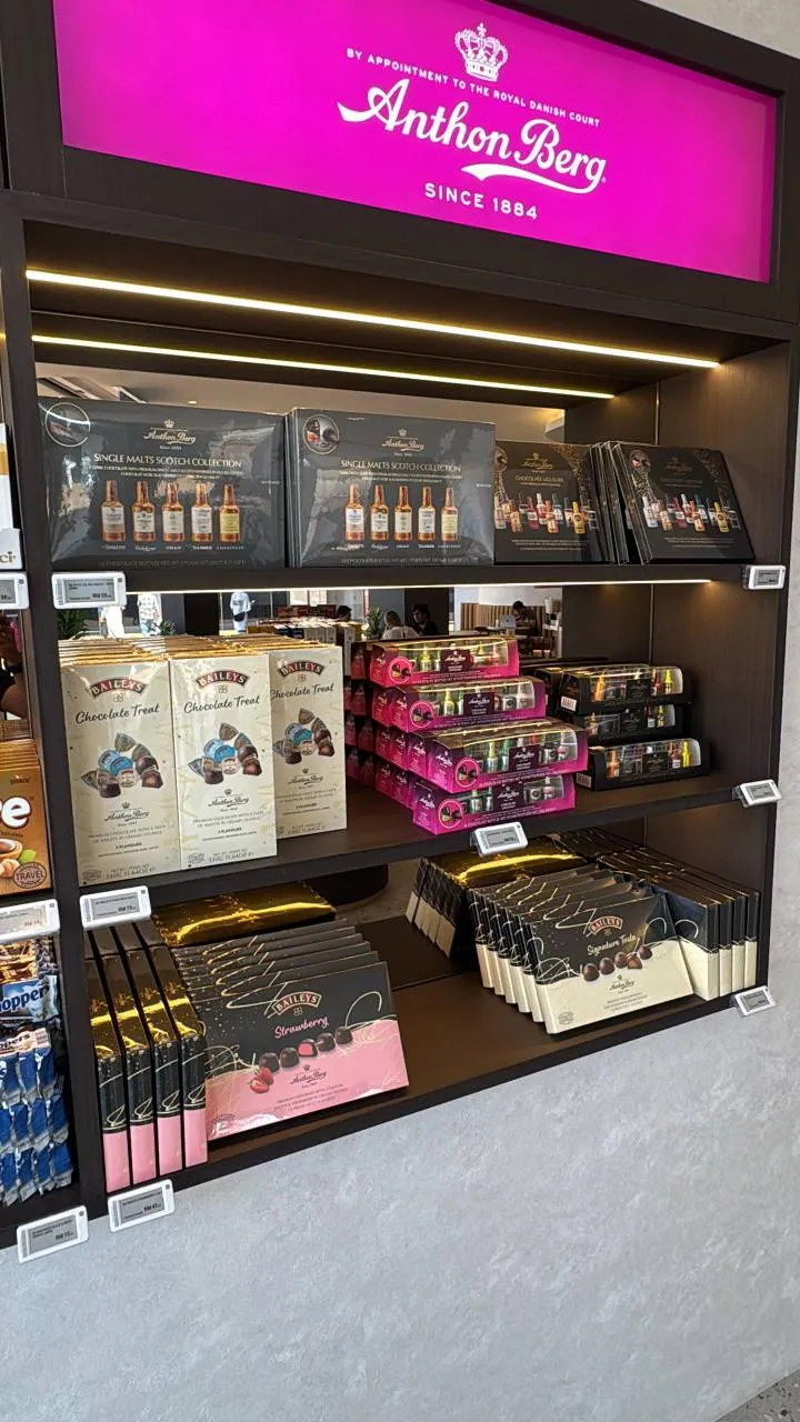 Electronic shelf labels installed across a live branded retail display